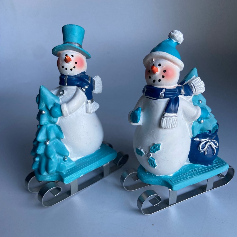 Two Snowmen on Sleds
